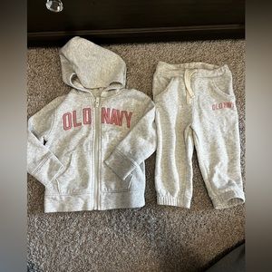 Grey sweatsuit with pink lettering